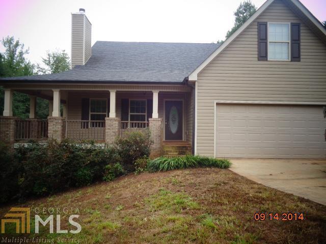 155 Whippoorwill Ridge Road Jackson, GA 30233 - Photo 1 of 1 a view of a house with a yard and plants
