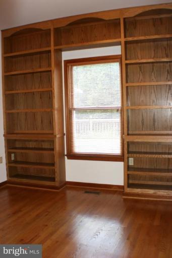 8124 Stone Ridge Drive Frederick, MD 21702 - Photo 11 of 28 a view of walk in closet with empty racks