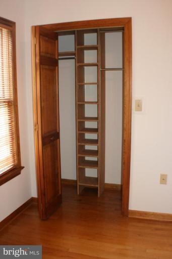 8124 Stone Ridge Drive Frederick, MD 21702 - Photo 12 of 28 a view of walk in closet with empty racks