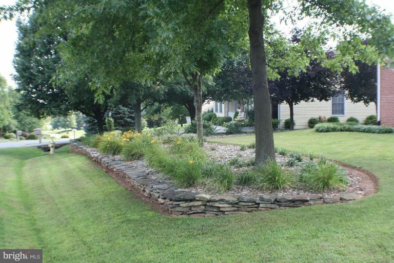 8124 Stone Ridge Drive Frederick, MD 21702 - Photo 22 of 28 a view of a park with large trees