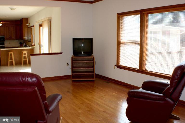 8124 Stone Ridge Drive Frederick, MD 21702 - Photo 7 of 28 a livingroom with workspace and a window