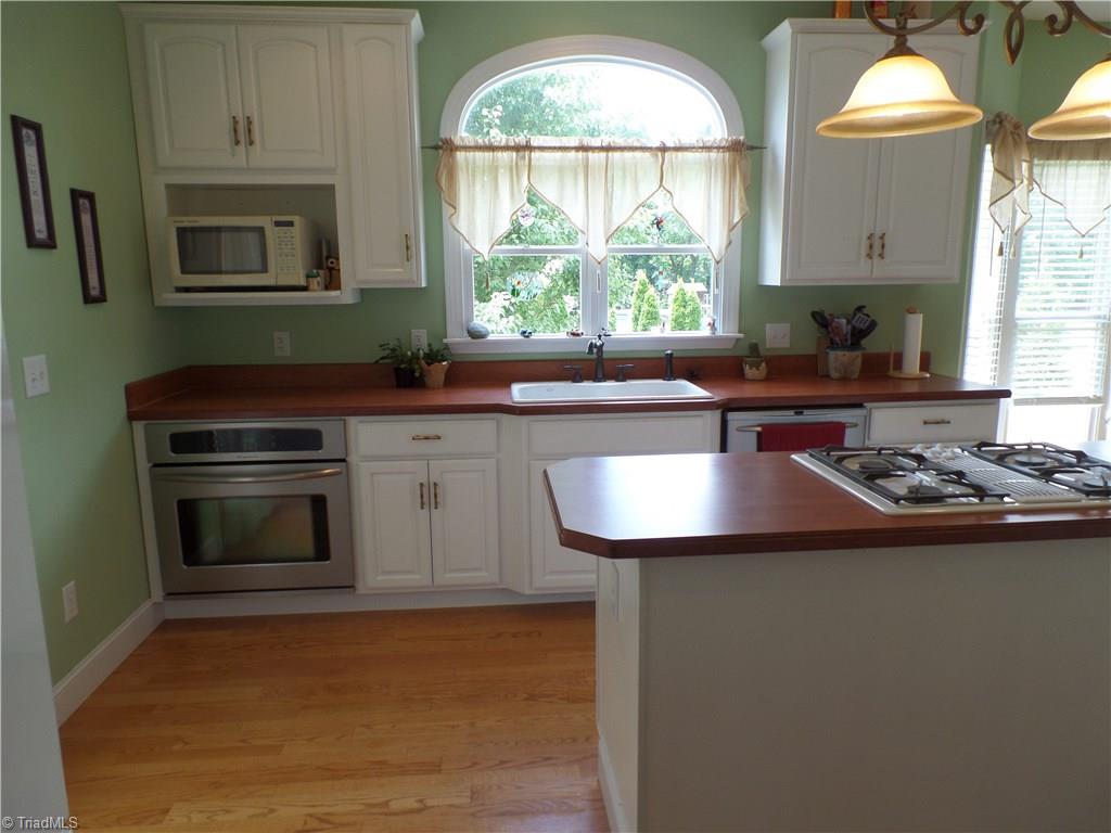 5322 Amick Road Julian, NC 27283 - Photo 13 of 29 Stainless Appliances. Cooktop.