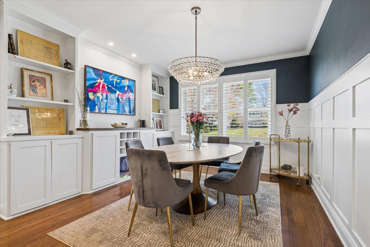 1114 Gamon Road Wheaton, IL 60189 - Photo 15 of 60 a view of a dining room with furniture wooden floor and chandelier