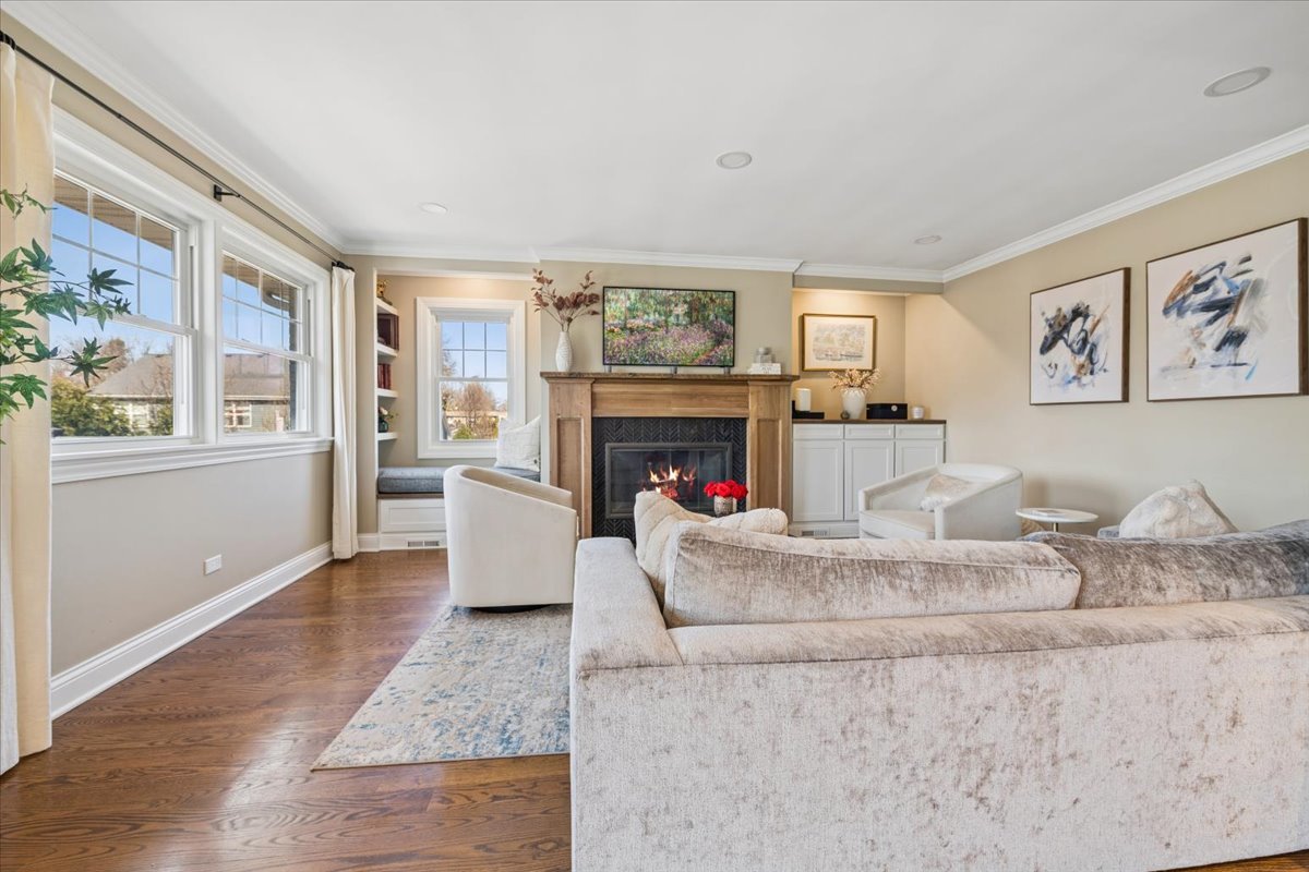 1114 Gamon Road Wheaton, IL 60189 - Photo 18 of 60 a living room with furniture and a fireplace