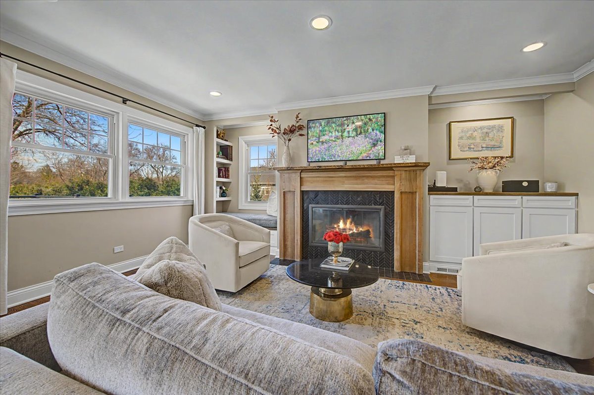 1114 Gamon Road Wheaton, IL 60189 - Photo 19 of 60 a living room with furniture and a fireplace