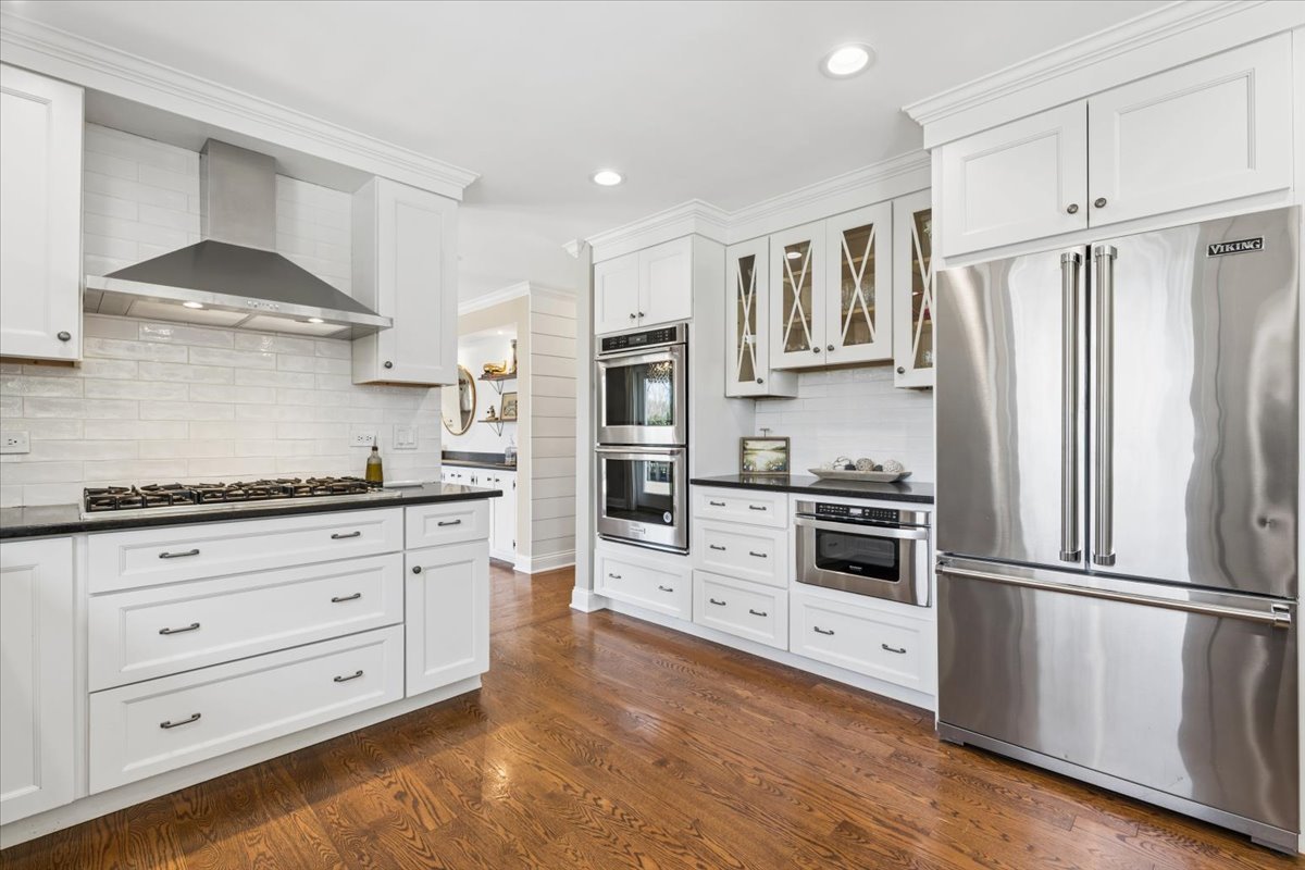 1114 Gamon Road Wheaton, IL 60189 - Photo 23 of 60 a kitchen with stainless steel appliances a refrigerator stove and sink