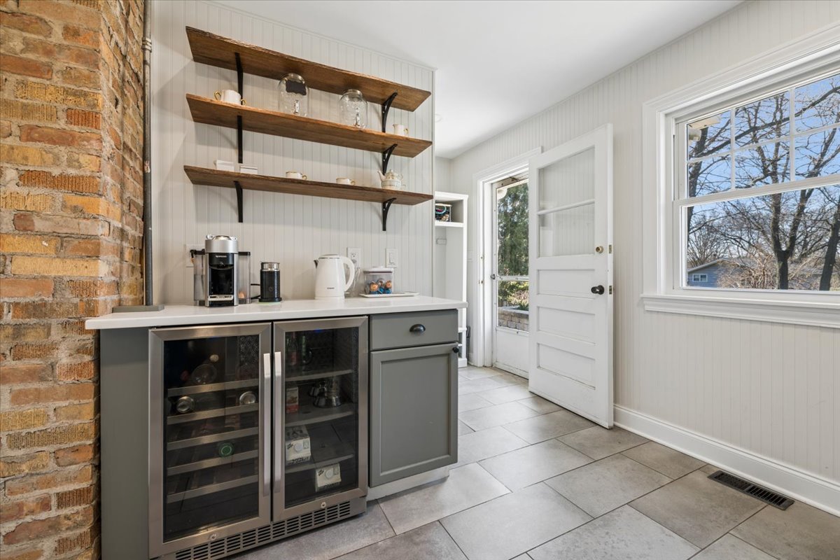 1114 Gamon Road Wheaton, IL 60189 - Photo 31 of 60 a kitchen with stainless steel appliances cabinets and a window