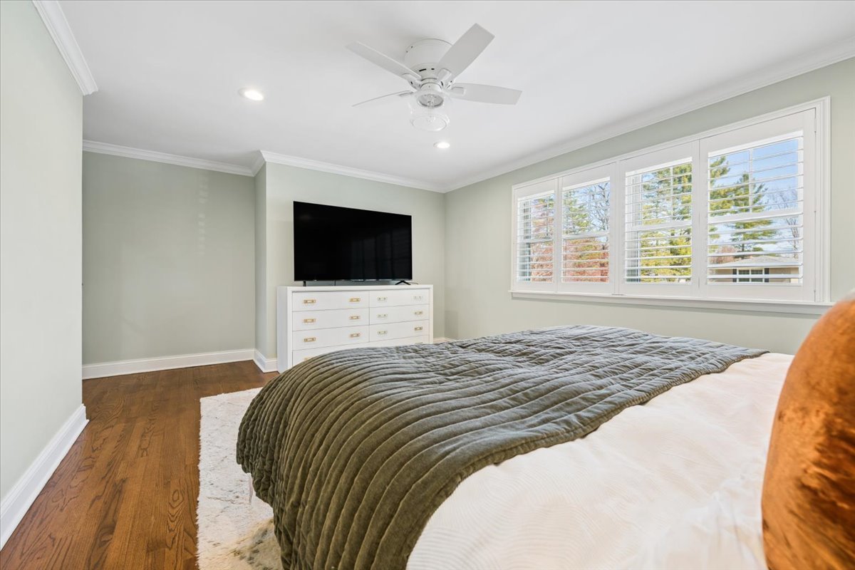 1114 Gamon Road Wheaton, IL 60189 - Photo 35 of 60 a bedroom with a bed and a flat screen tv