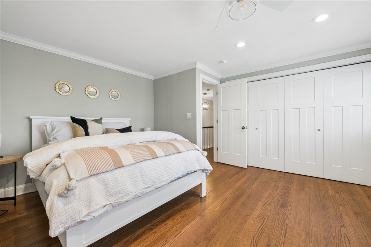 1114 Gamon Road Wheaton, IL 60189 - Photo 38 of 60 a bedroom with a bed and wooden floor