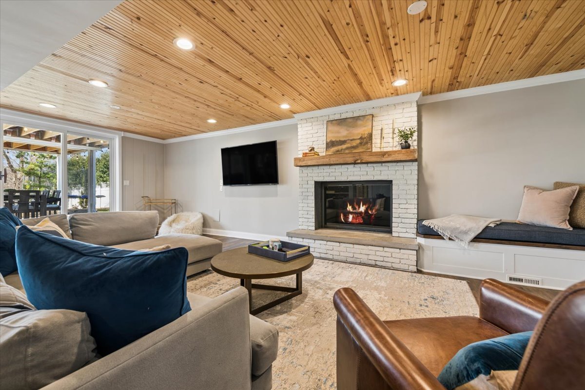 1114 Gamon Road Wheaton, IL 60189 - Photo 48 of 60 a living room with furniture and a fireplace