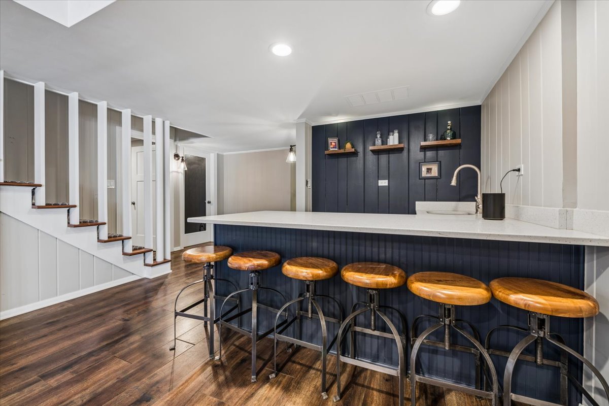 1114 Gamon Road Wheaton, IL 60189 - Photo 50 of 60 a kitchen with stainless steel appliances granite countertop a table and chairs in it