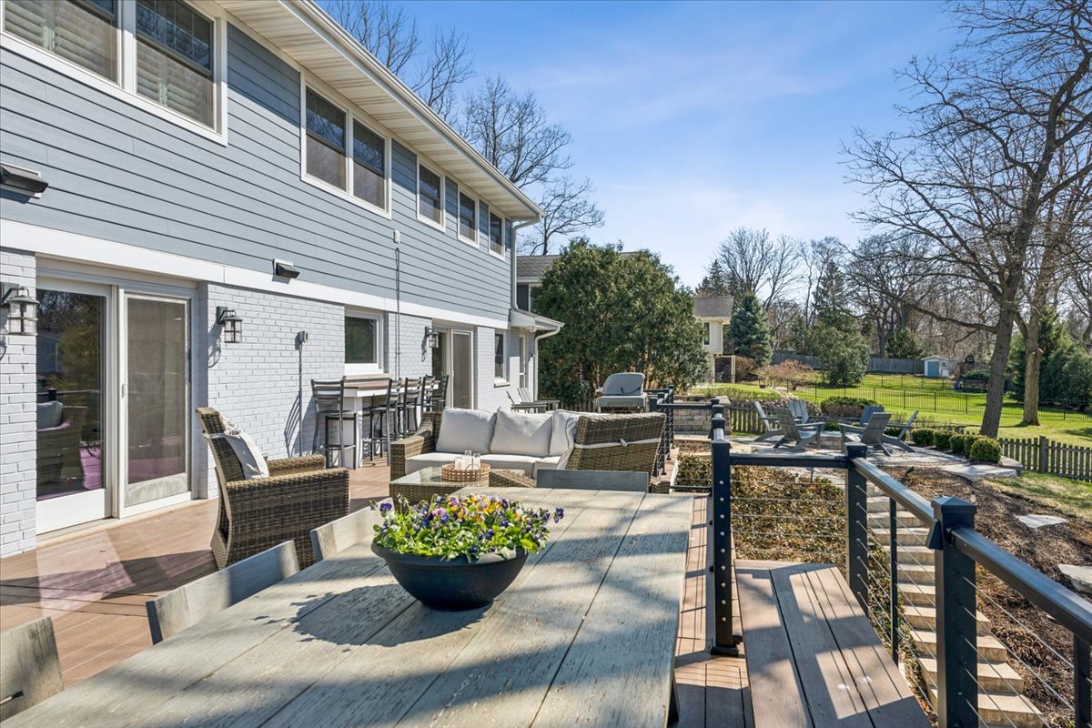 1114 Gamon Road Wheaton, IL 60189 - Photo 6 of 60 a view of a patio with couches table and chairs and potted plants