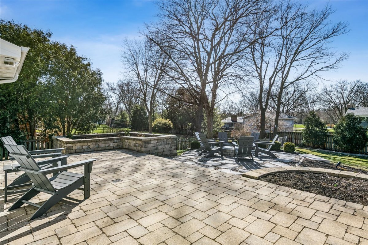1114 Gamon Road Wheaton, IL 60189 - Photo 10 of 60 a view of backyard with sitting area and bench