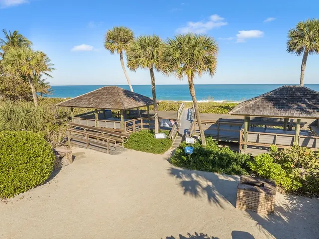 an outdoor view of patio with umbrella