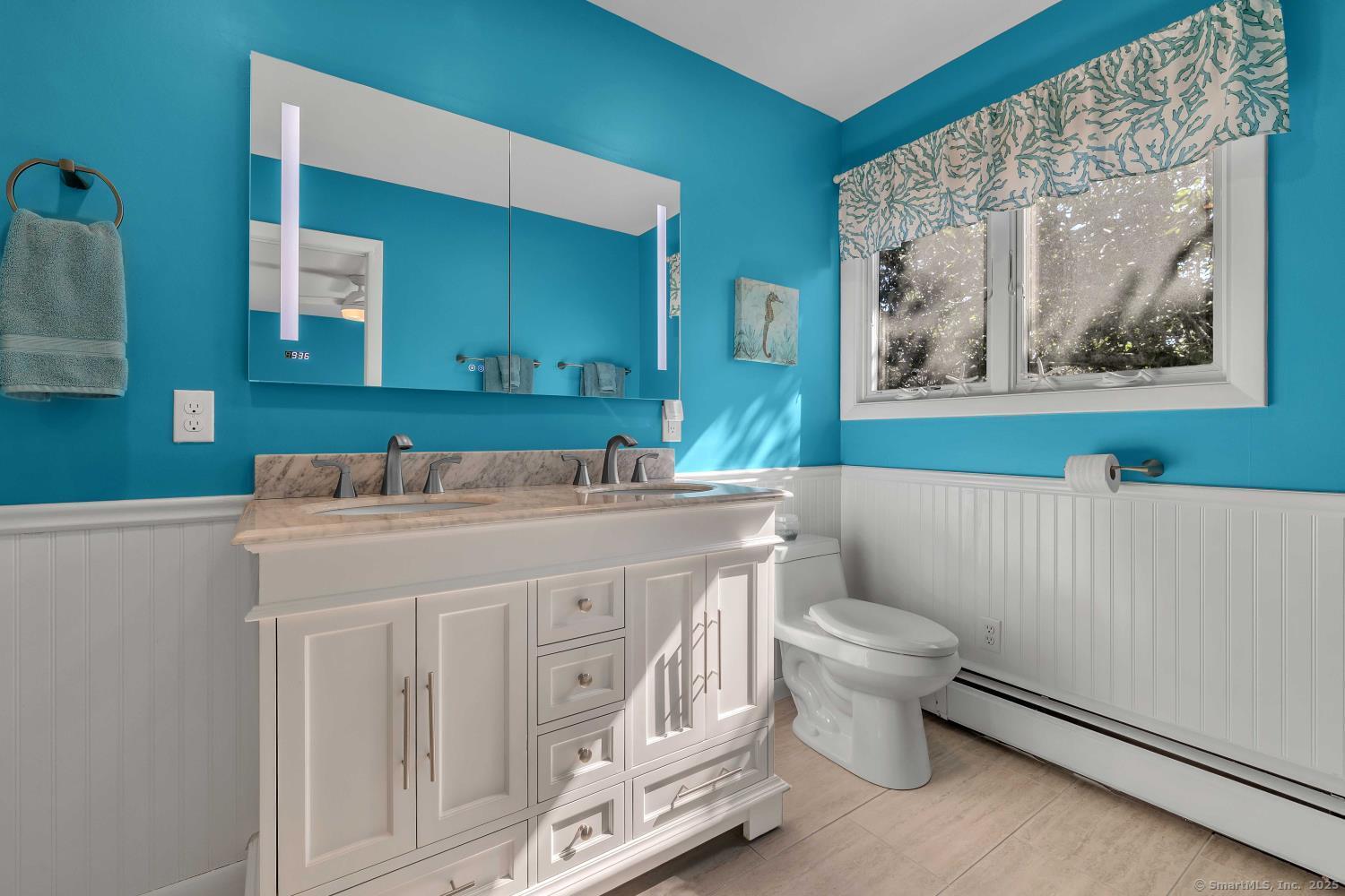 33 Fenwood Road Old Saybrook, CT 06475 - Photo 21 of 37 a bathroom with a sink a toilet and a mirror