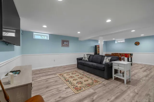 a living room with furniture and a couch