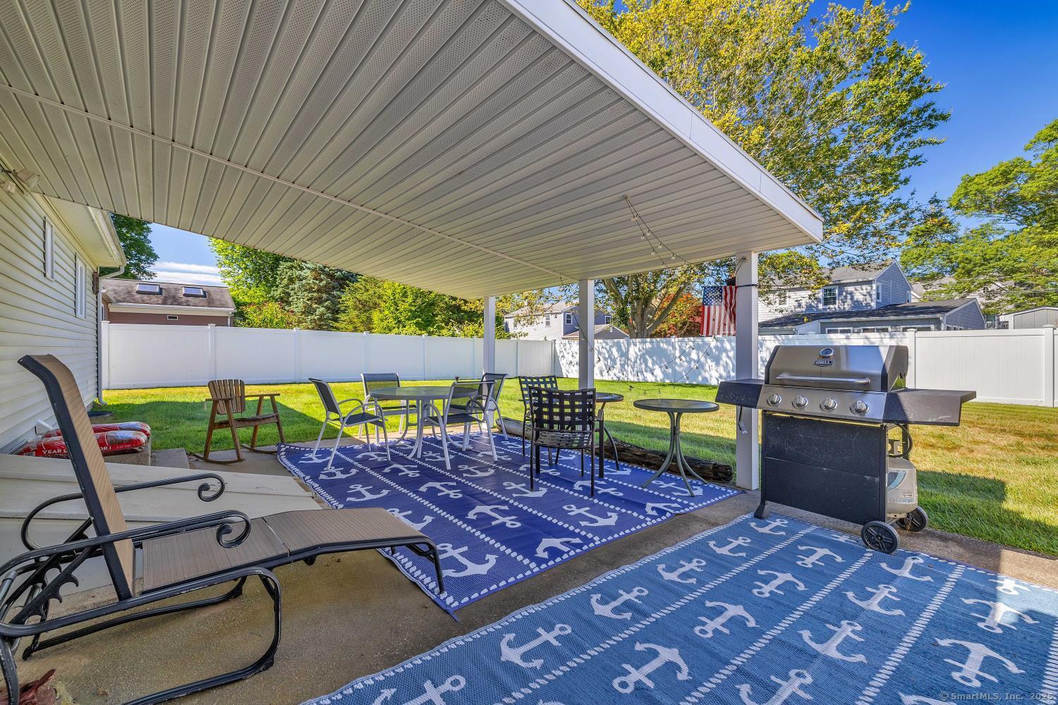 33 Fenwood Road Old Saybrook, CT 06475 - Photo 26 of 37 a view of a backyard with sitting area
