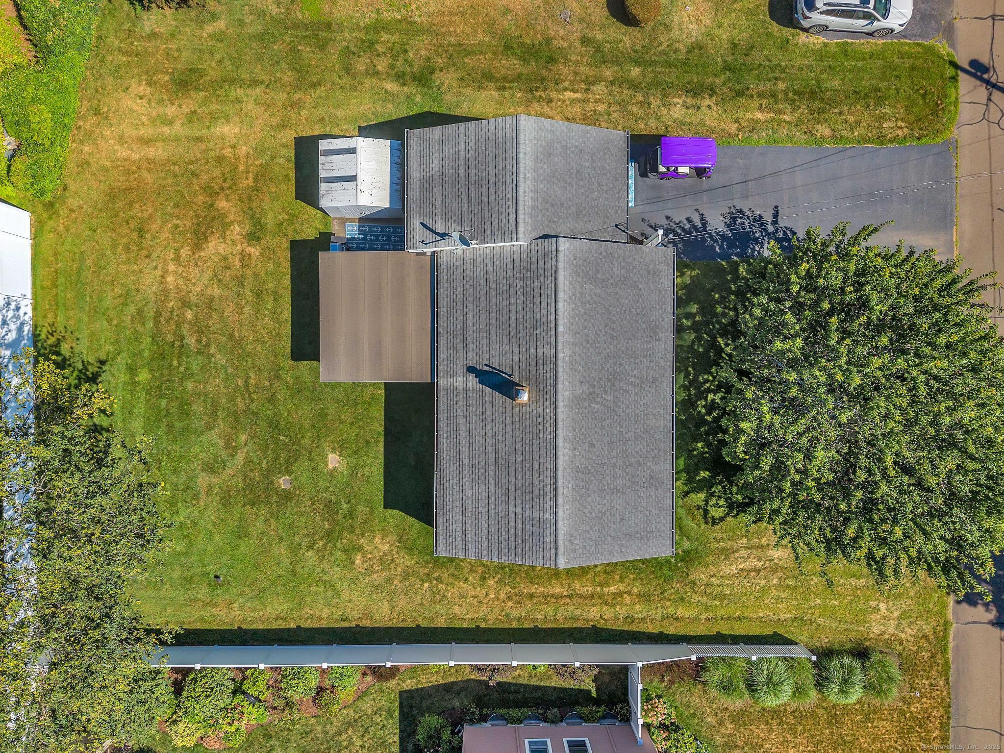 33 Fenwood Road Old Saybrook, CT 06475 - Photo 31 of 37 aerial view of a house with a yard and large tree