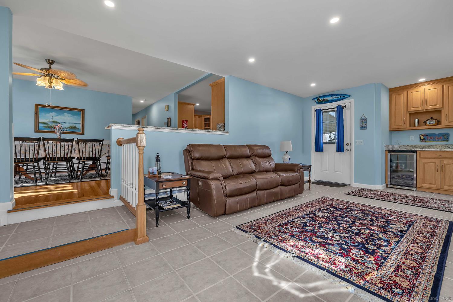 33 Fenwood Road Old Saybrook, CT 06475 - Photo 4 of 37 a living room with furniture and a flat screen tv