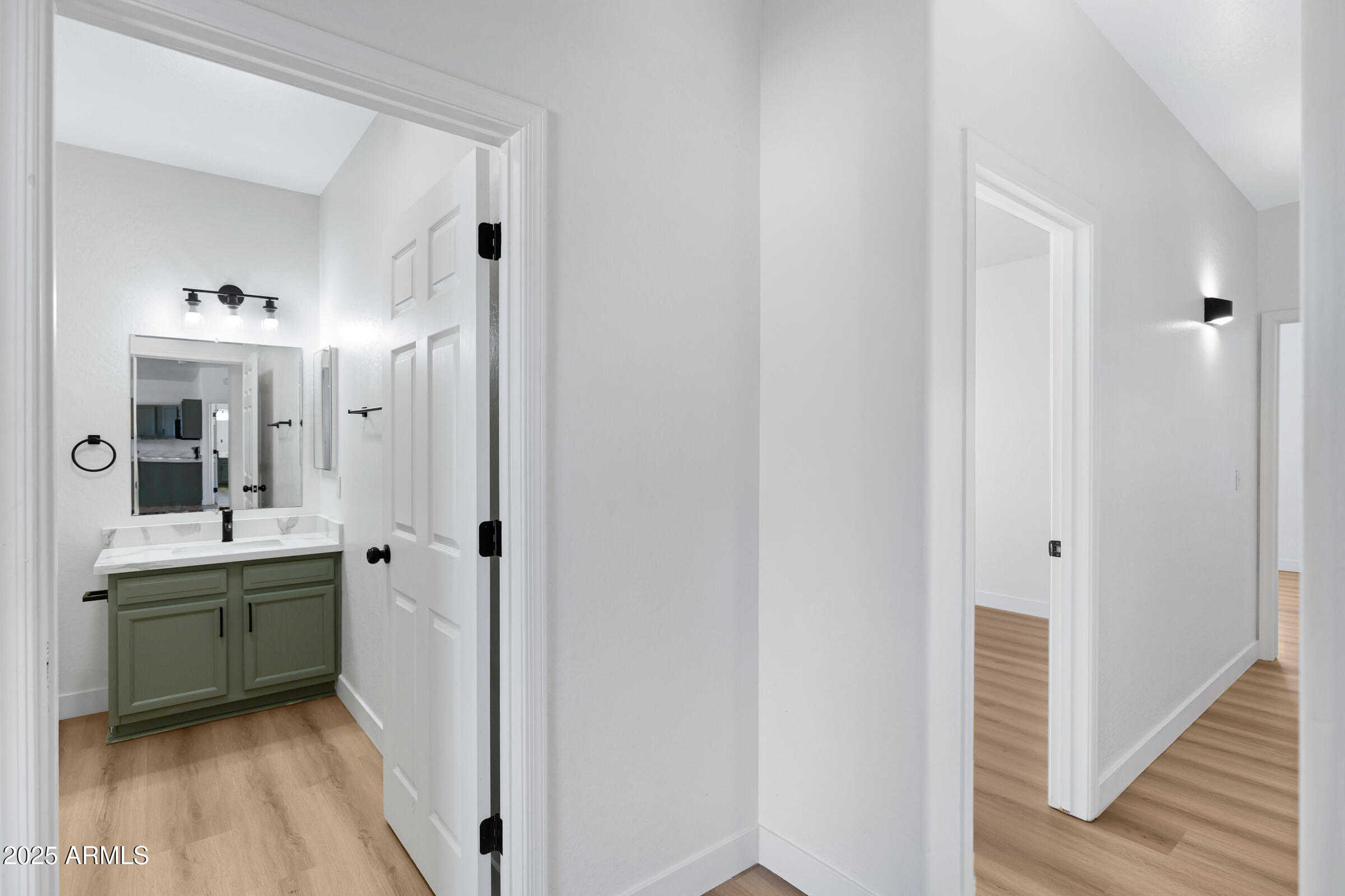 34247 West Pecan Road Tonopah, AZ 85354 - Photo 16 of 31 a view of a bathroom from a hallway