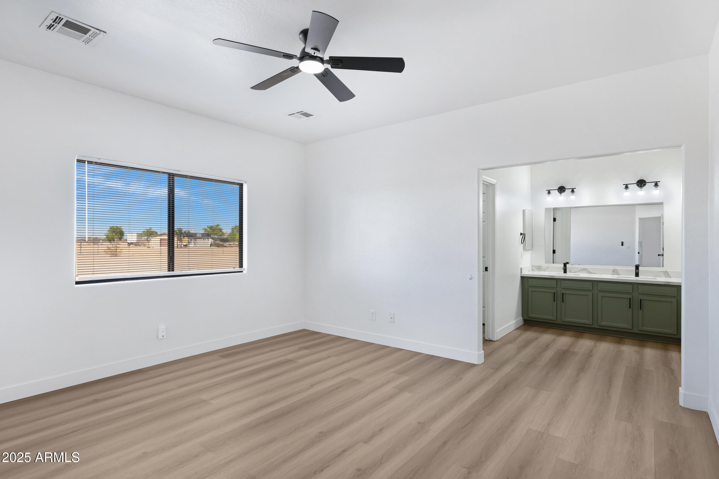 34247 West Pecan Road Tonopah, AZ 85354 - Photo 21 of 31 a large white kitchen with a large window