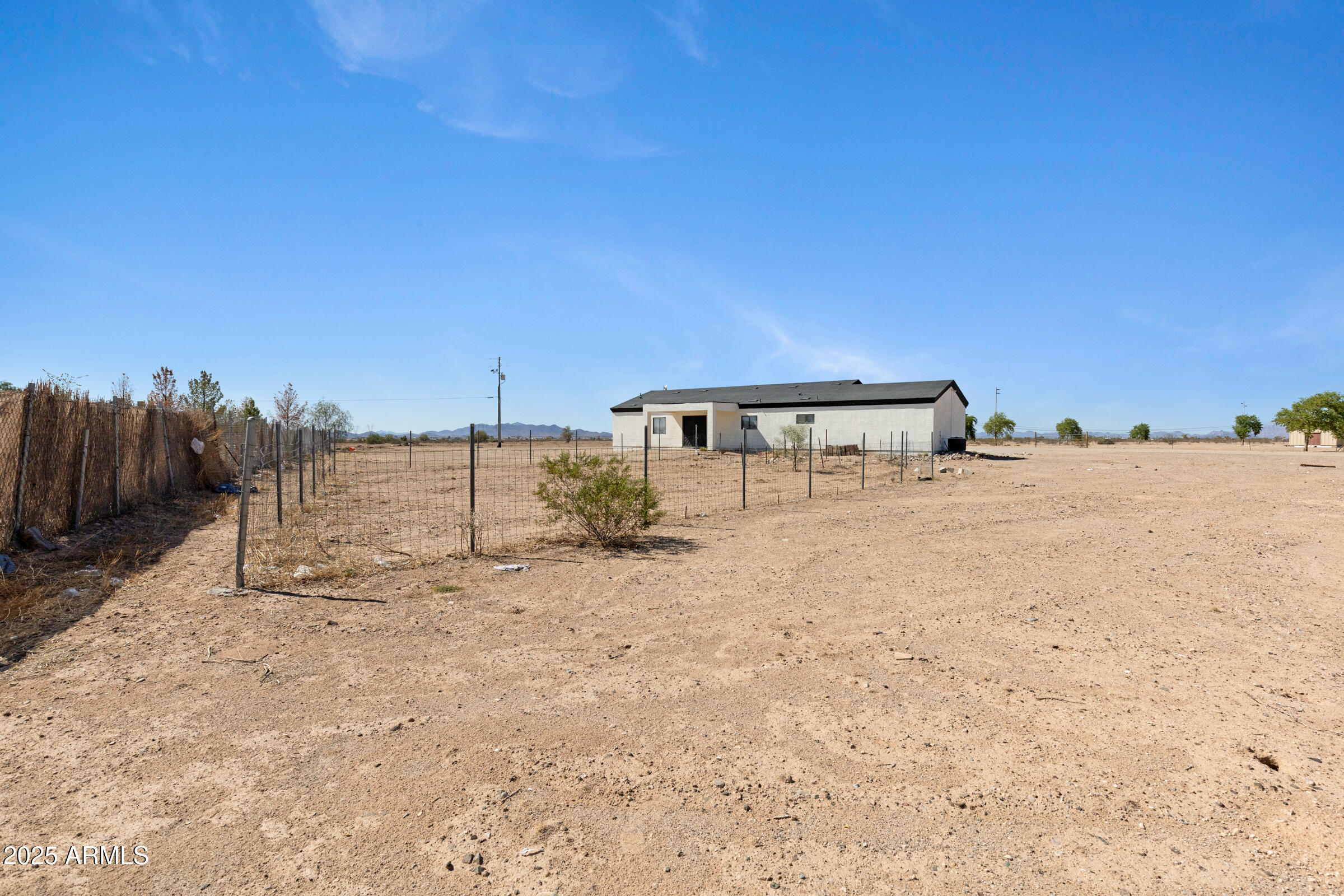 34247 West Pecan Road Tonopah, AZ 85354 - Photo 28 of 31 a view of a house with a snow in the background