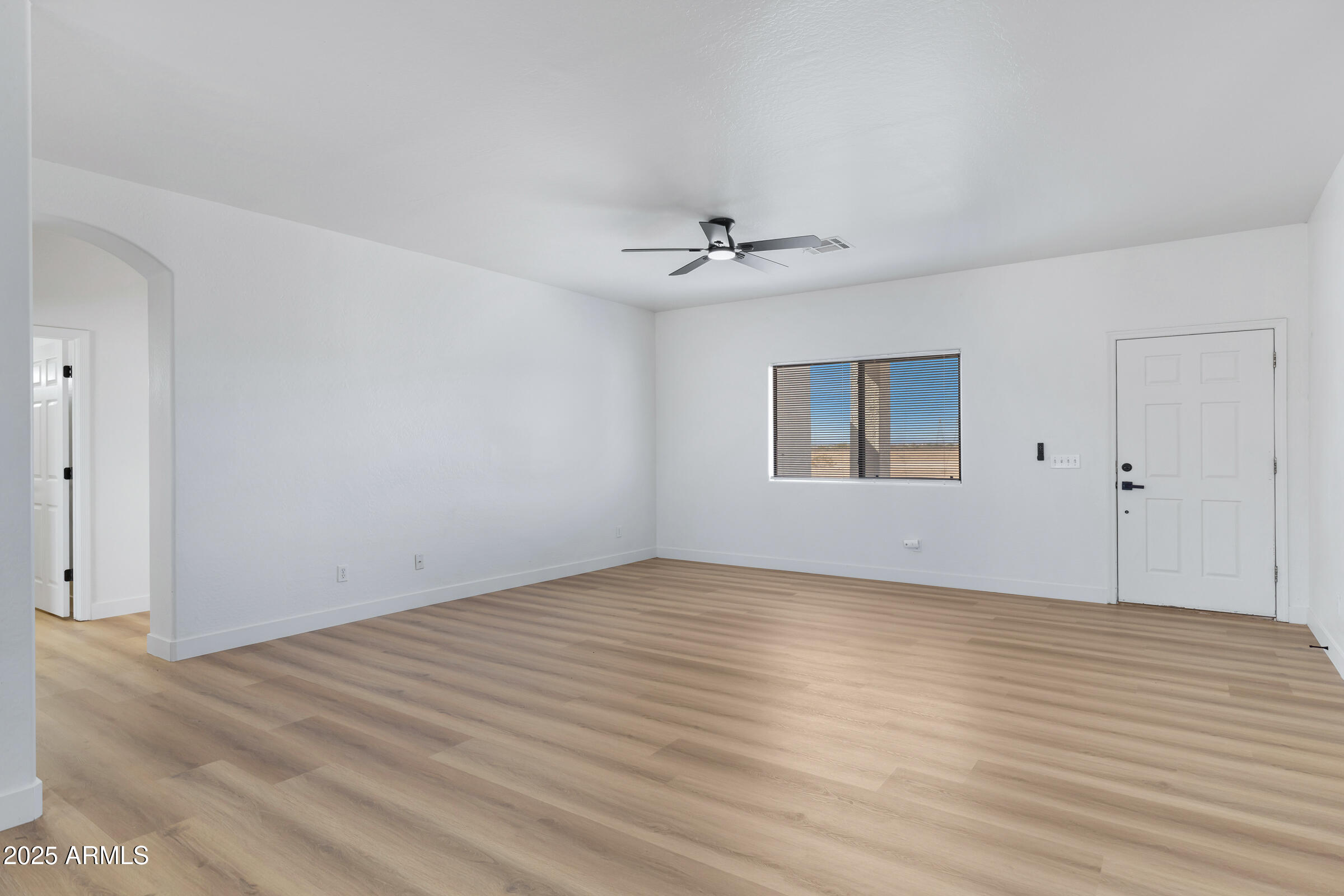 34247 West Pecan Road Tonopah, AZ 85354 - Photo 7 of 31 a view of an empty room with a window
