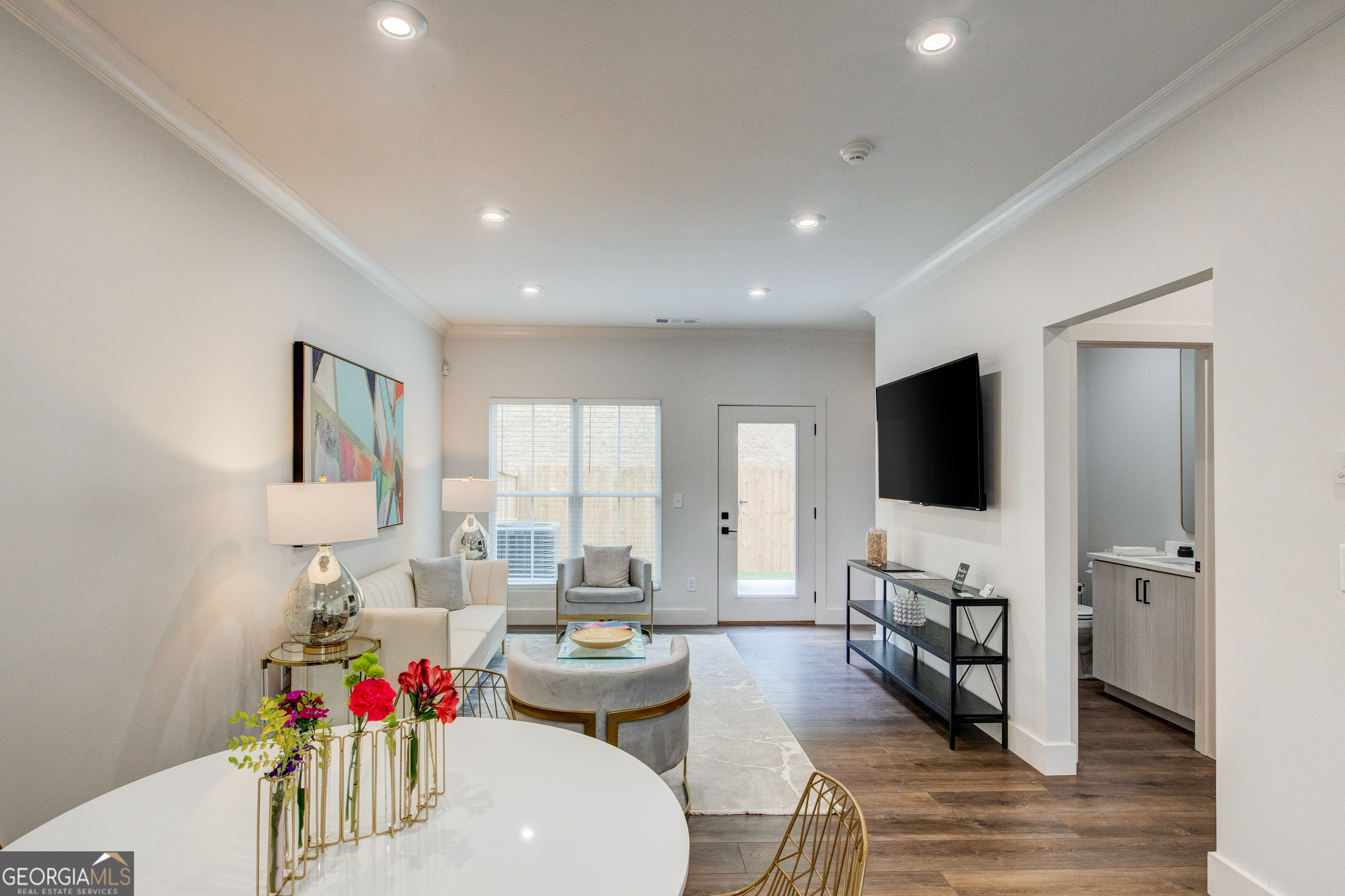 79 Chateau Drive Southeast Rome, GA 30161 - Photo 17 of 46 a living room with furniture and a flat screen tv