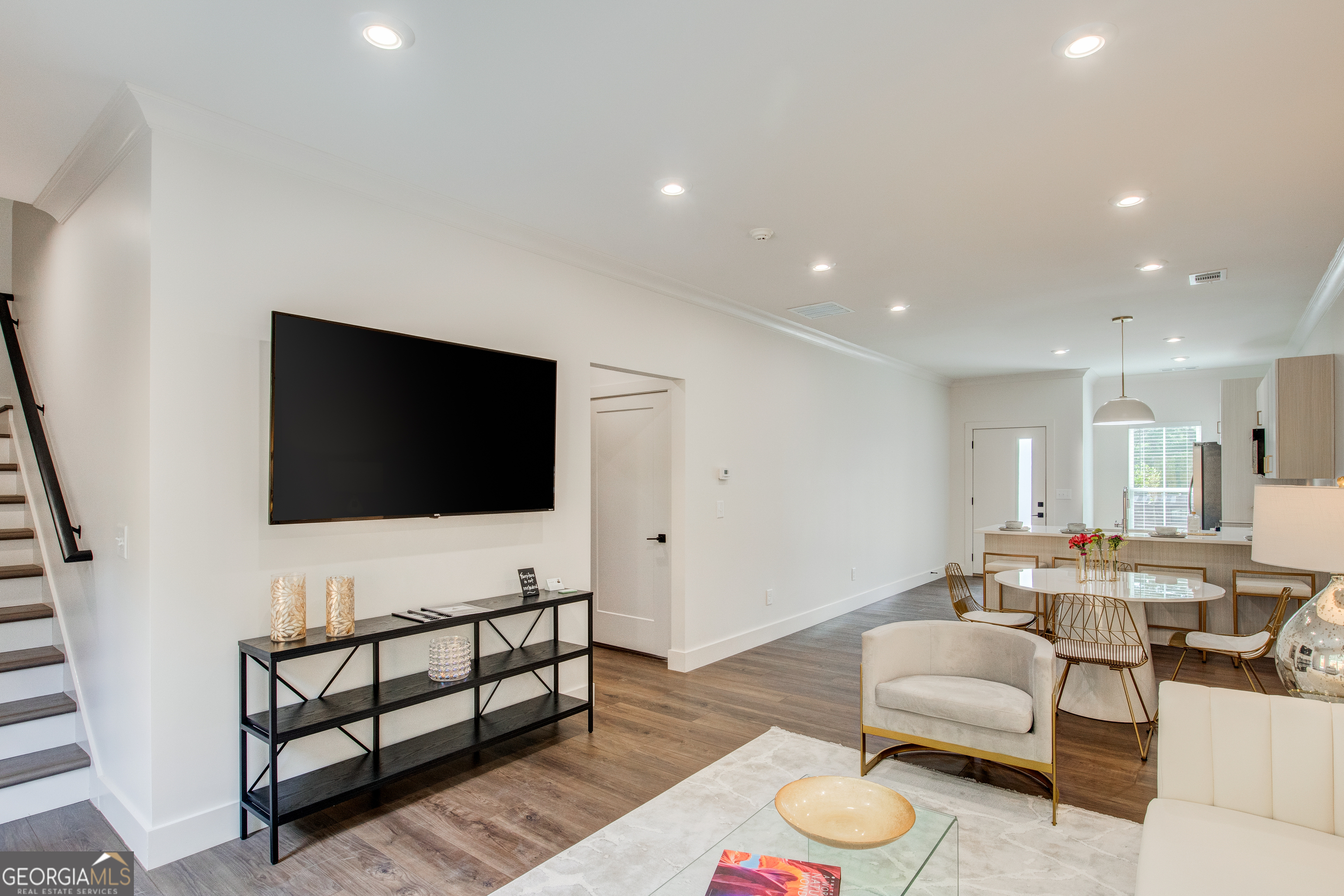 79 Chateau Drive Southeast Rome, GA 30161 - Photo 22 of 46 a living room with furniture and a flat screen tv