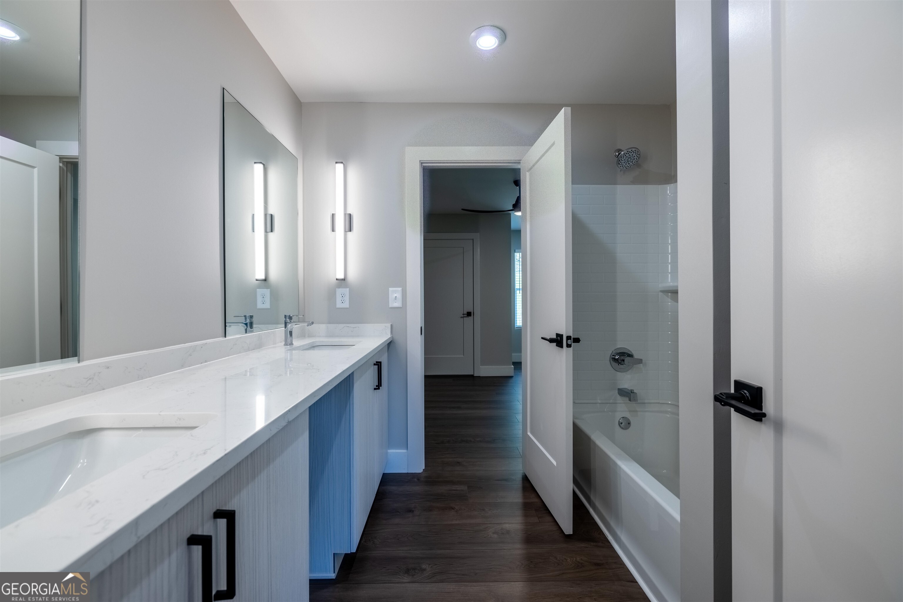 79 Chateau Drive Southeast Rome, GA 30161 - Photo 33 of 46 a bathroom with a double vanity sink and mirror
