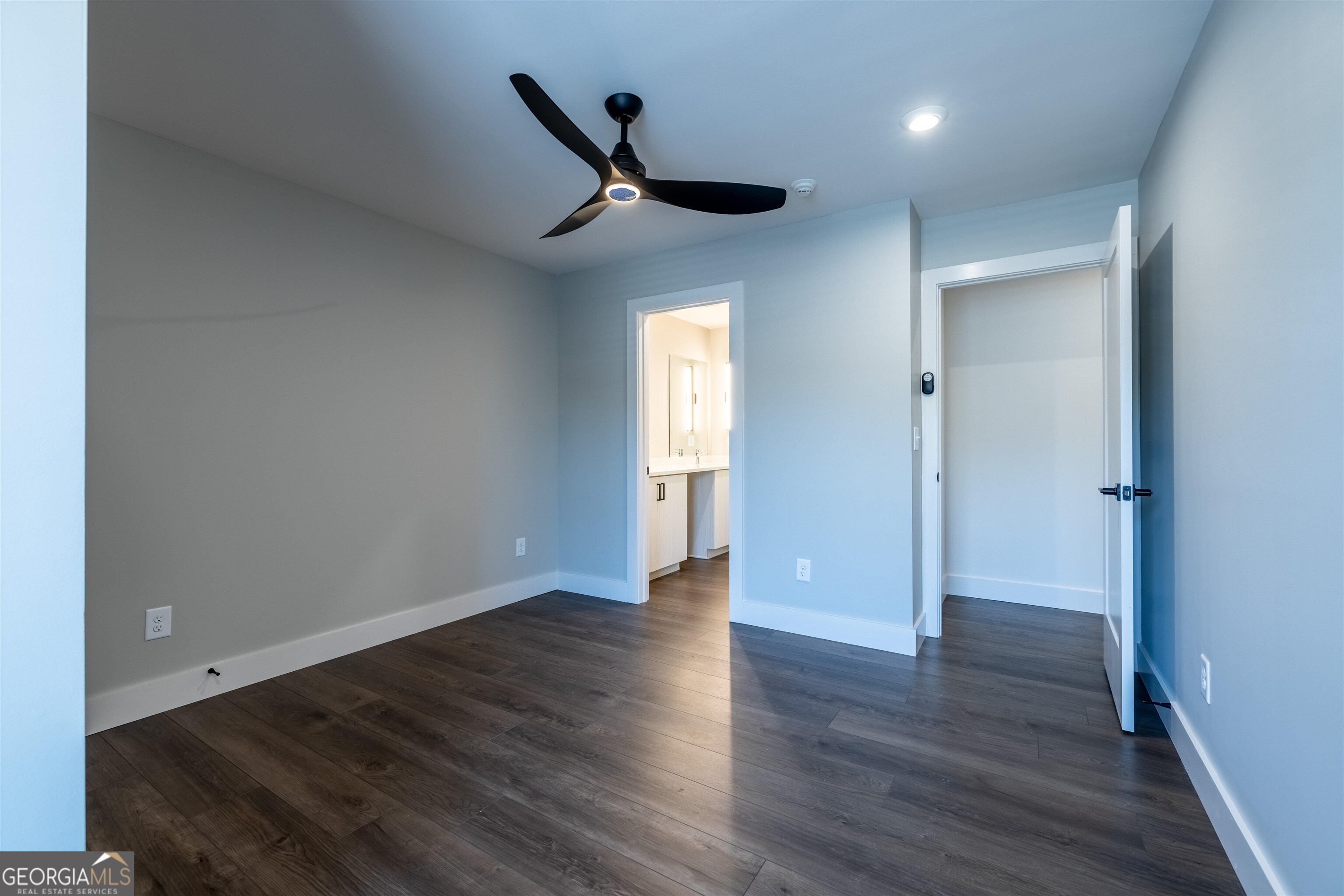 79 Chateau Drive Southeast Rome, GA 30161 - Photo 34 of 46 an empty room with wooden floor and windows