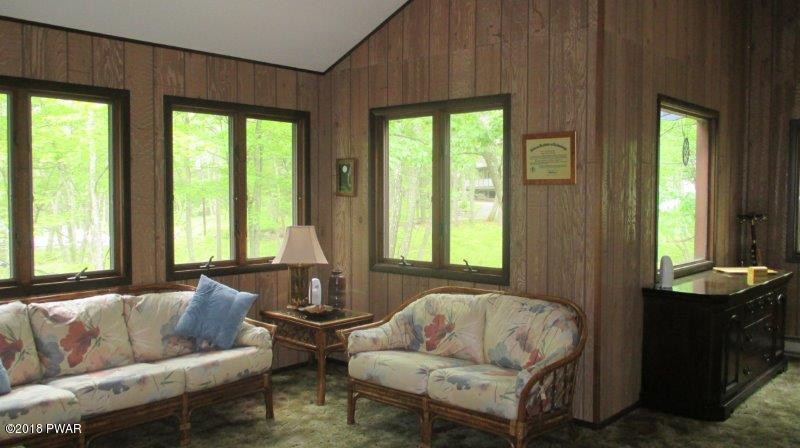 804 Rodeo Court Hawley, PA 18428 - Photo 19 of 37 a living room with furniture and a large window