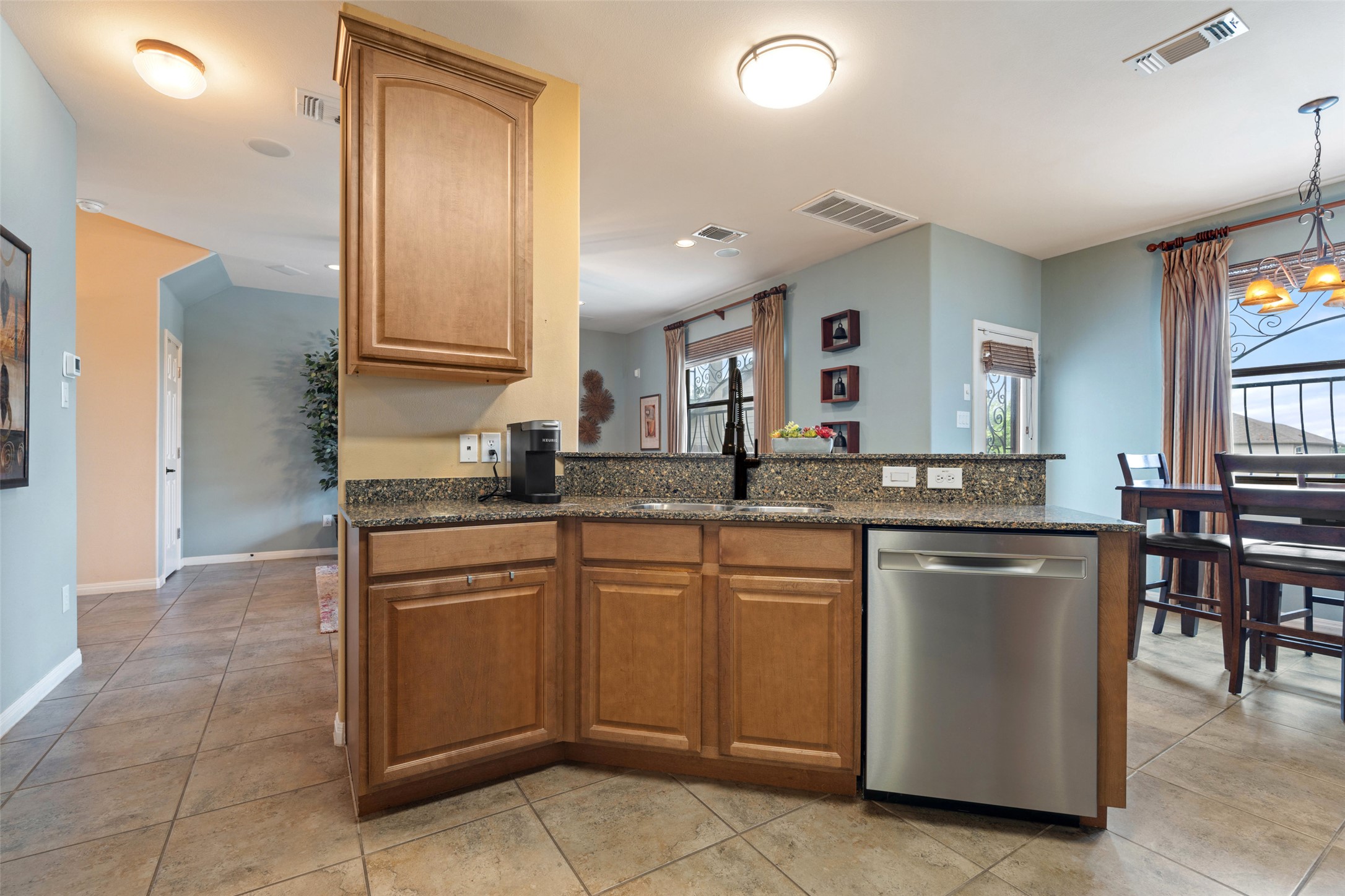 6006 Seville Drive Austin, TX 78724 - Photo 17 of 38 a kitchen with a sink and cabinets