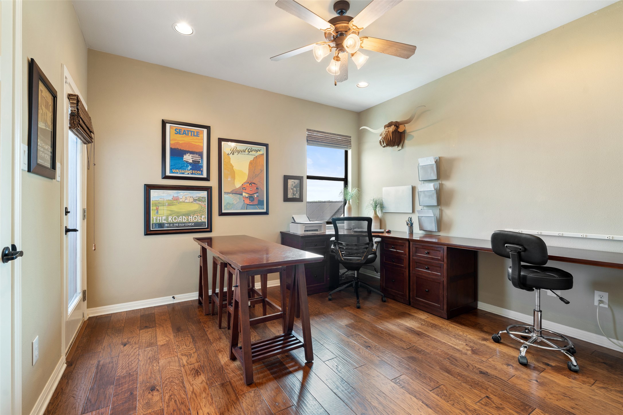 6006 Seville Drive Austin, TX 78724 - Photo 28 of 38 a view of a workspace with furniture and a window