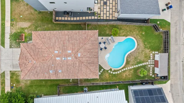 a view of swimming pool with a balcony