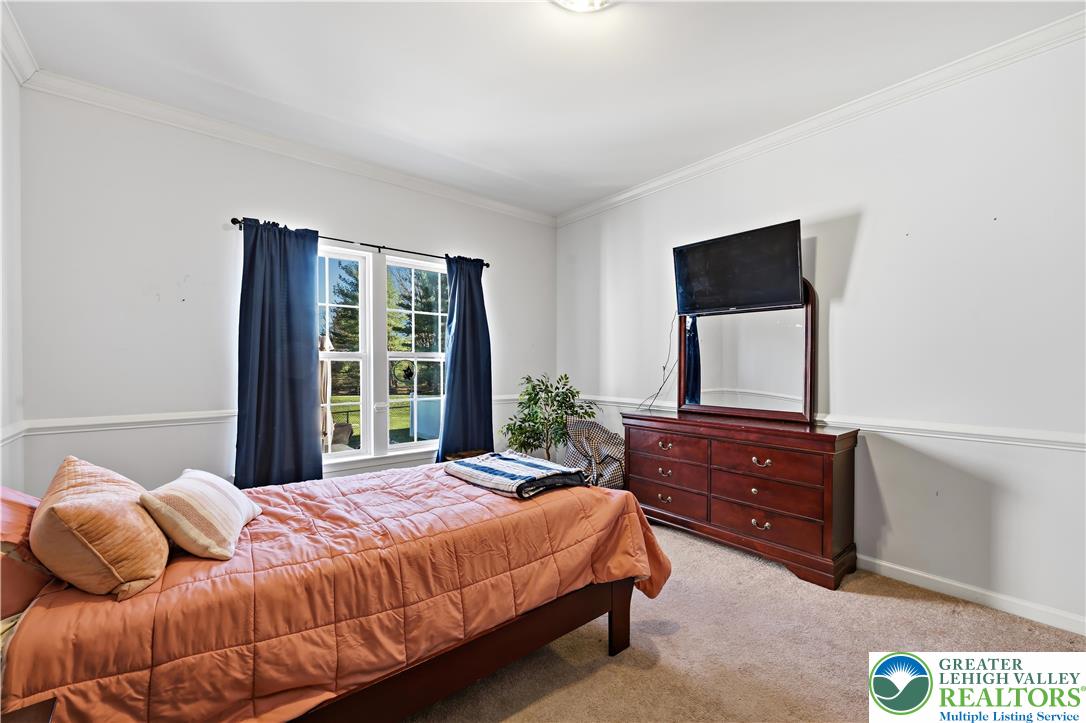 130 Lower Way Road Easton, PA 18045 - Photo 35 of 56 a bedroom with a bed and a dresser
