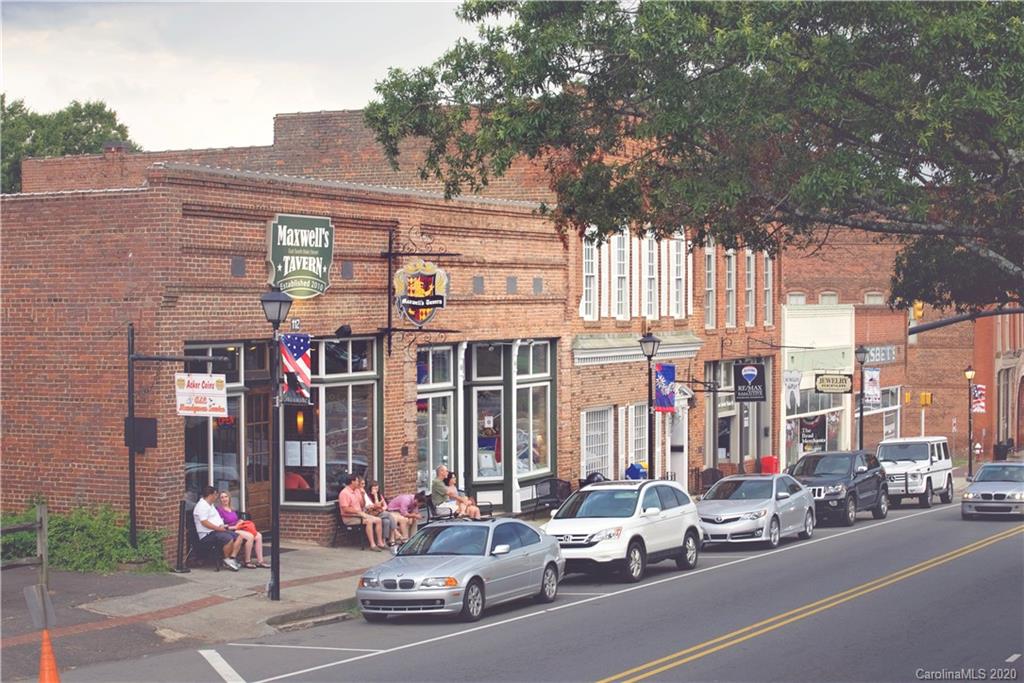 a view of a parked cars in front of a building