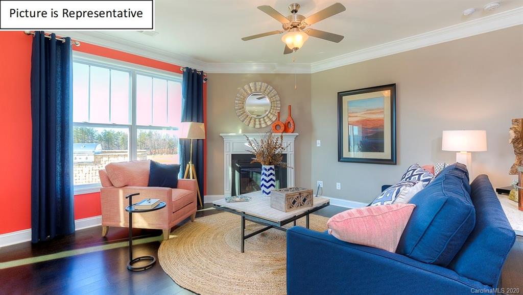 8007 Oakmere Road Waxhaw, NC 28173 - Photo 11 of 40 a living room with furniture and a window
