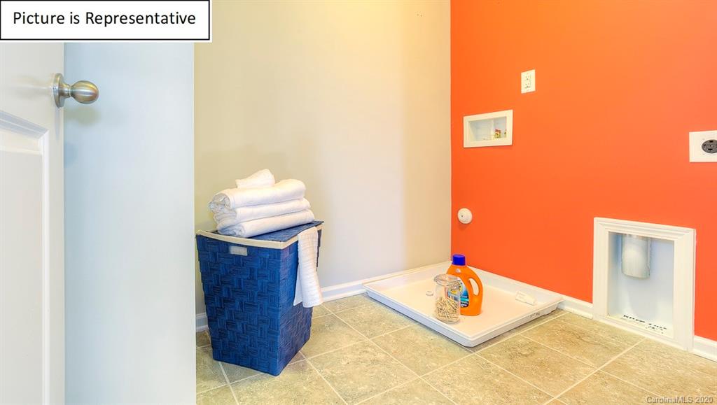 8007 Oakmere Road Waxhaw, NC 28173 - Photo 15 of 40 a living room with furniture and a window