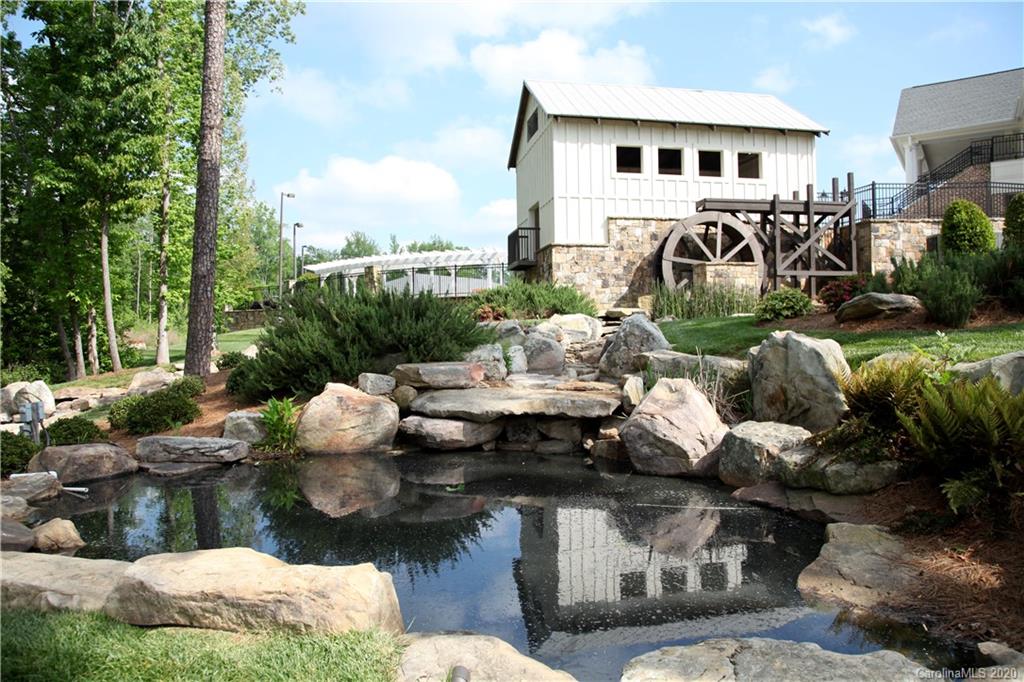 8007 Oakmere Road Waxhaw, NC 28173 - Photo 28 of 40 a view of a patio with couches table and chairs and potted plants