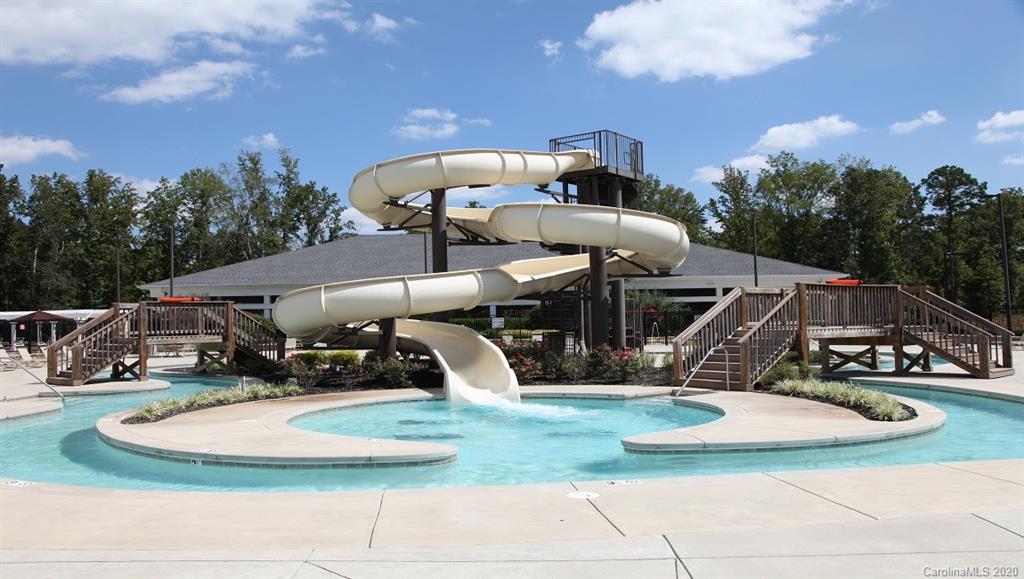 8007 Oakmere Road Waxhaw, NC 28173 - Photo 34 of 40 a roof deck with table and chairs