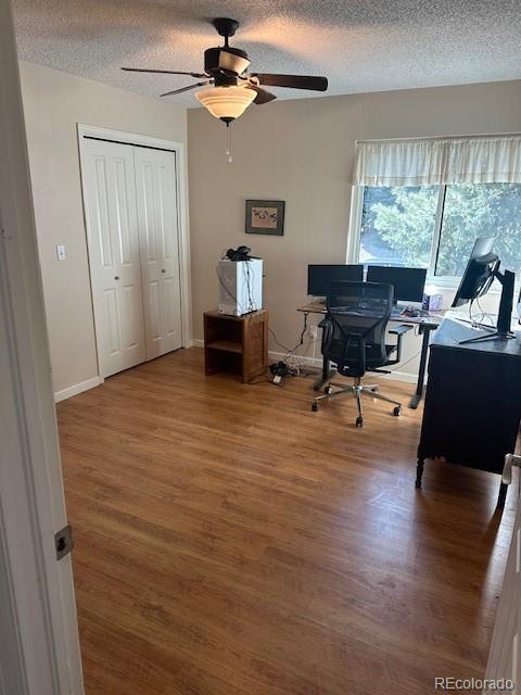 8865 Thunderbird Road Parker, CO 80134 - Photo 19 of 33 a view of room with workspace and windows