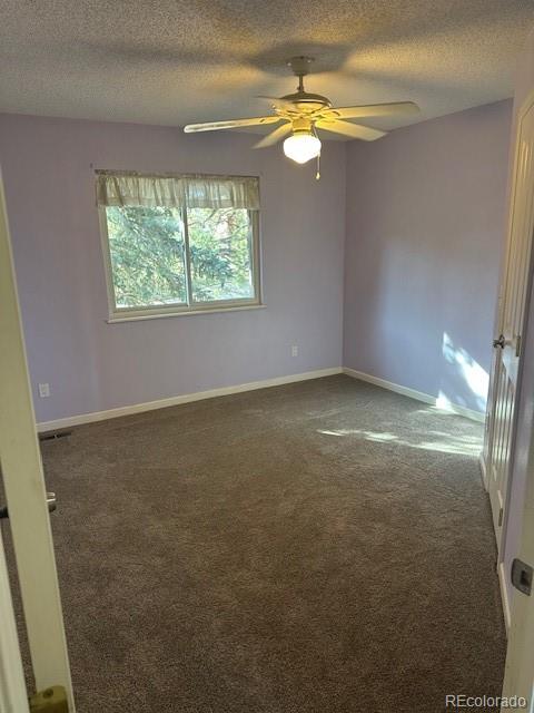 8865 Thunderbird Road Parker, CO 80134 - Photo 33 of 33 an empty room with a window