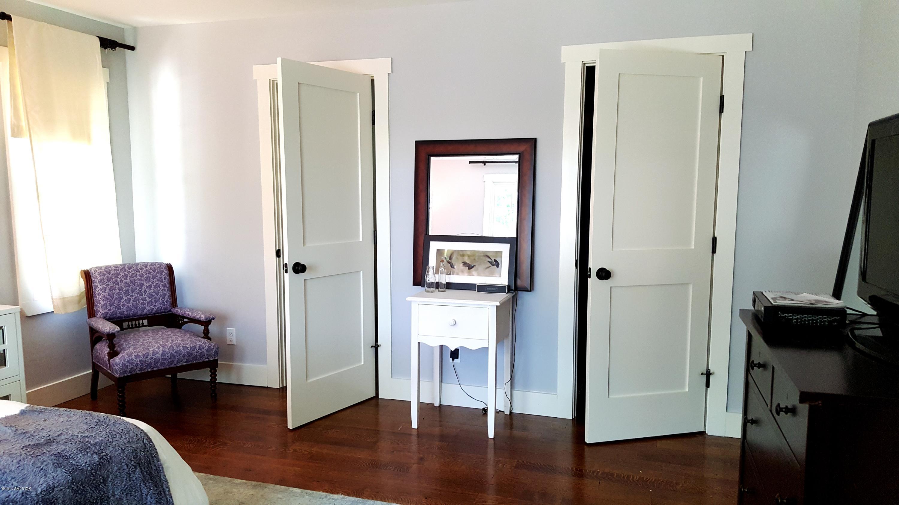 2 Cary Road Riverside, CT 06878 - Photo 18 of 24 a room with wooden floor and furniture