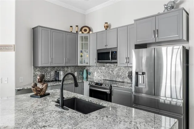 a close view of a utility room with washer and dryer