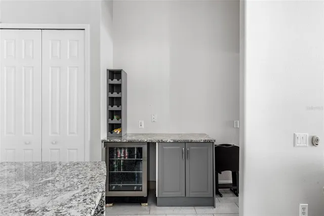 a view of a storage & utility room with a sink