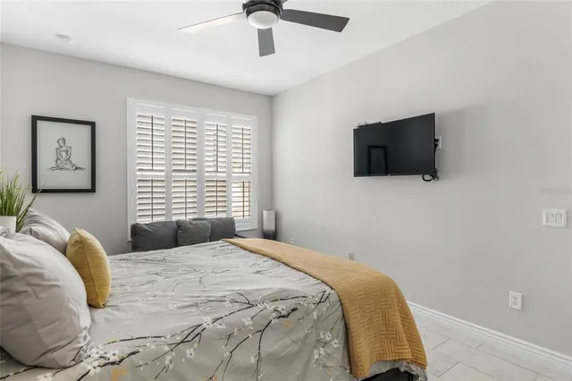 a work room with furniture and book shelf