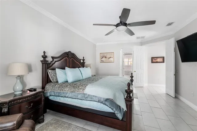 a bathroom with a double vanity sink and a window