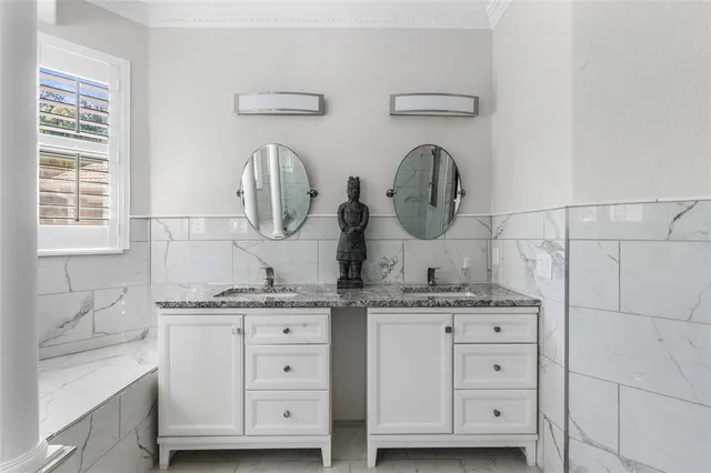 a view of a swimming pool with a bench in patio