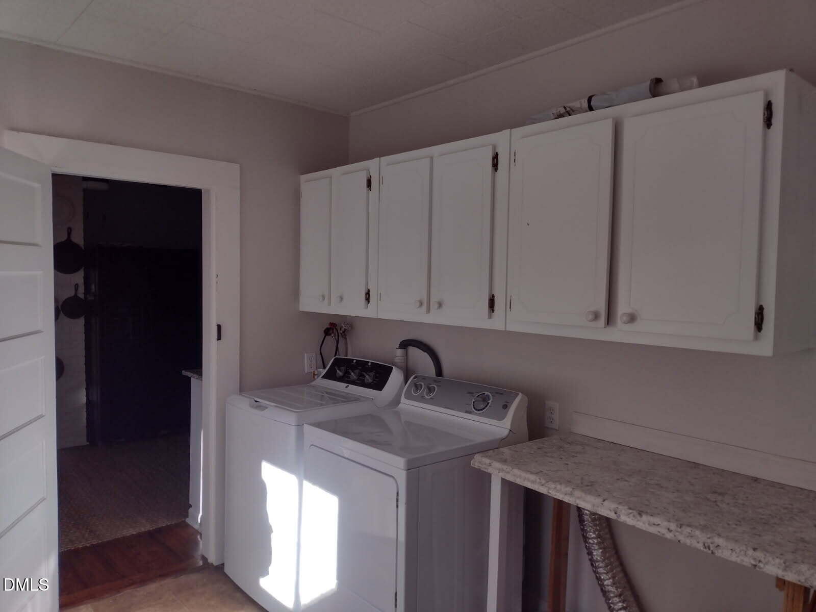 659 Chestnut Grove Road Spruce Pine, NC 28777 - Photo 19 of 21 a kitchen with a sink and cabinets